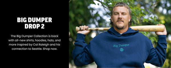 Big Dumper Drop 2 - The Big Dumper Collection is back with all-new shirts, hoodies, hats, and more inspired by Cal Raleigh and his connection to Seattle. Shop now.
