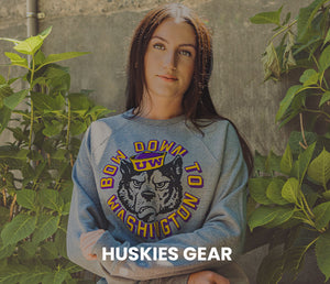 Shop Huskies Gear, Portrait of Model Wearing A Sonics Satin Jacket.