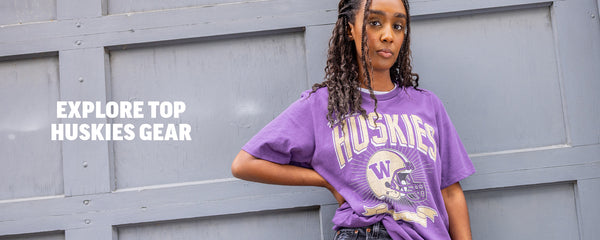 Woman wearing Huskies T-Shirt. Explore Top Huskies Gear - Shop Huskies. 